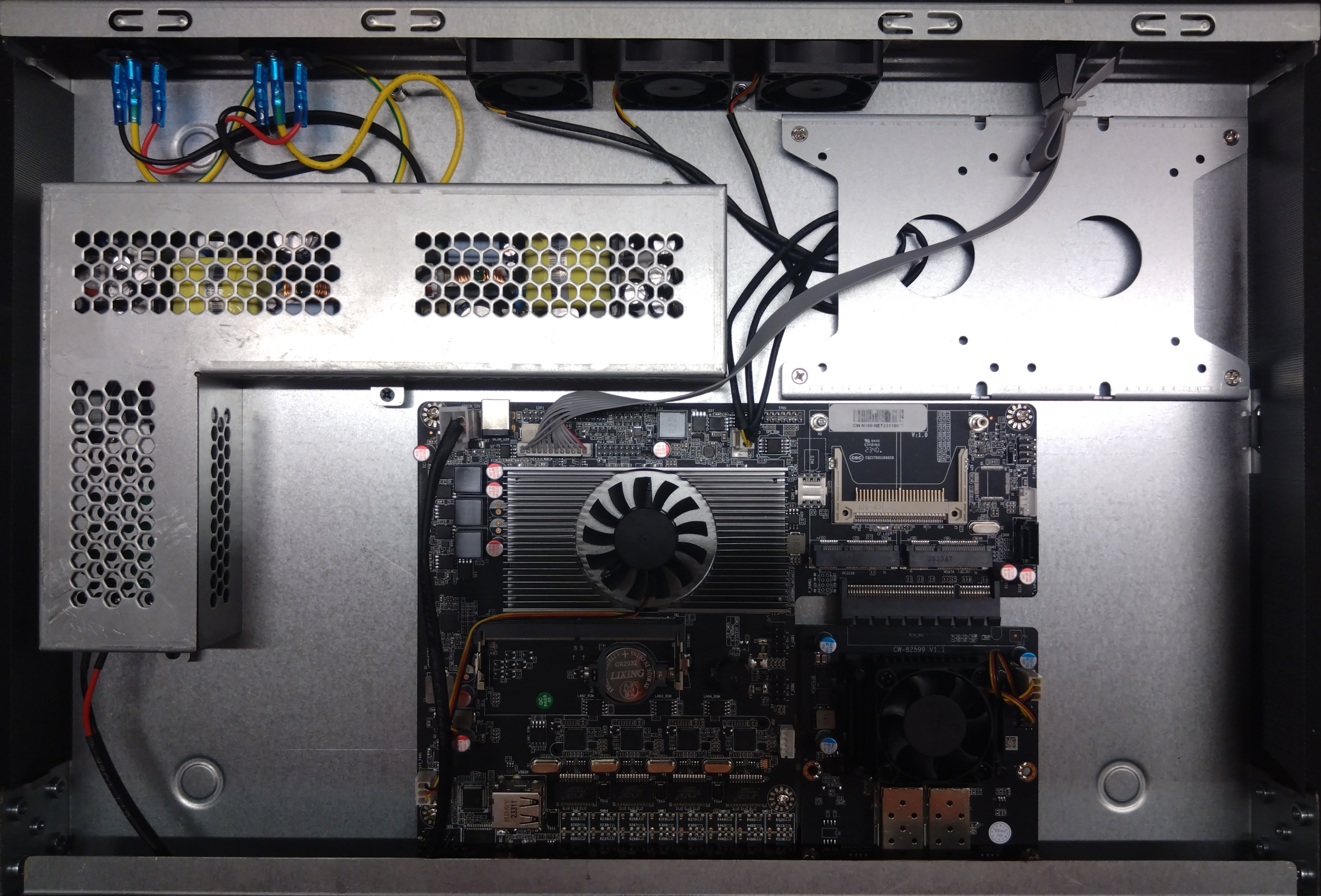 The in­tern­als of this server, with the PSU cover in­tact